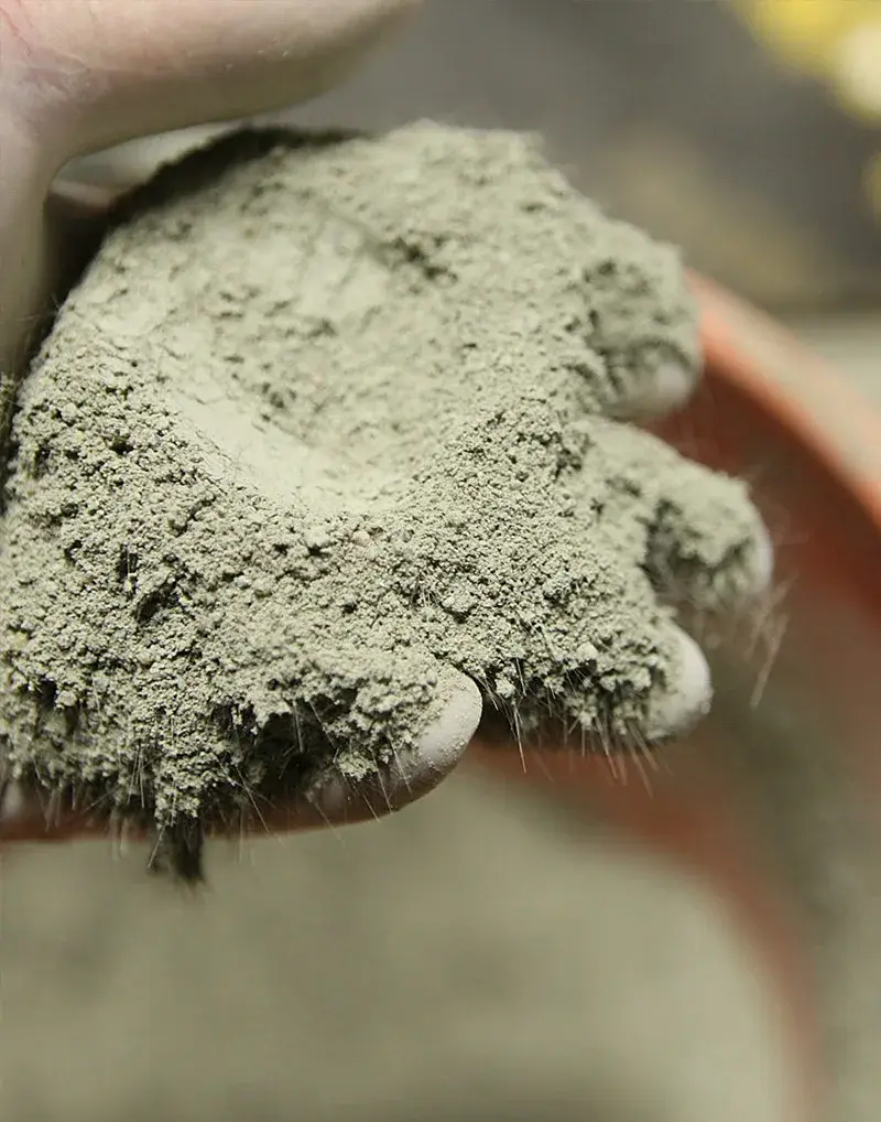 Basalt fibres being introduced into a concrete mix